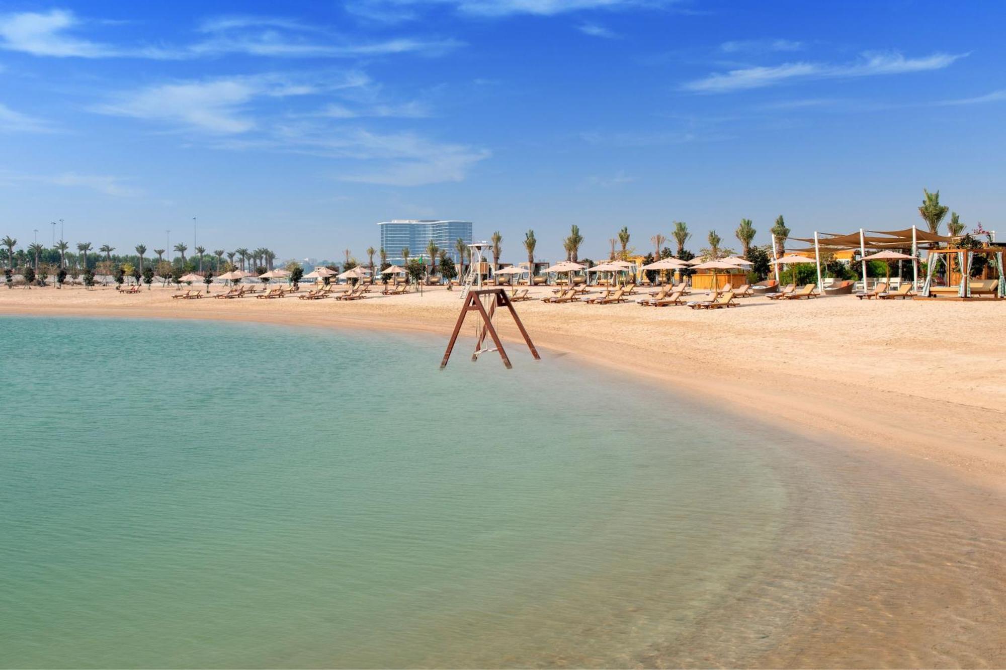 The Ritz-Carlton, Doha Hotel Exterior photo The beach at Jumeirah Beach Club